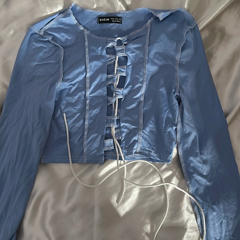 Light blue long sleeved tie up crop top